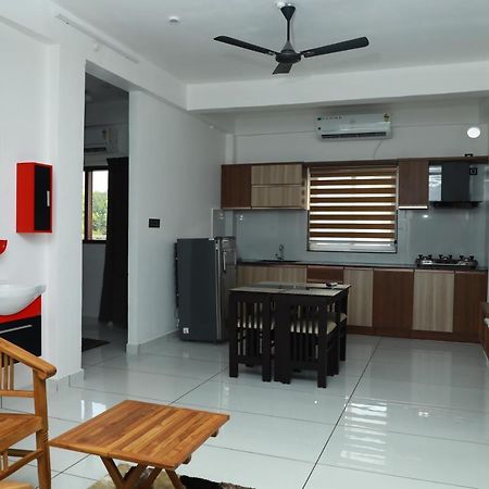 Achoos Residency Hotel Tiruvalla Buitenkant foto