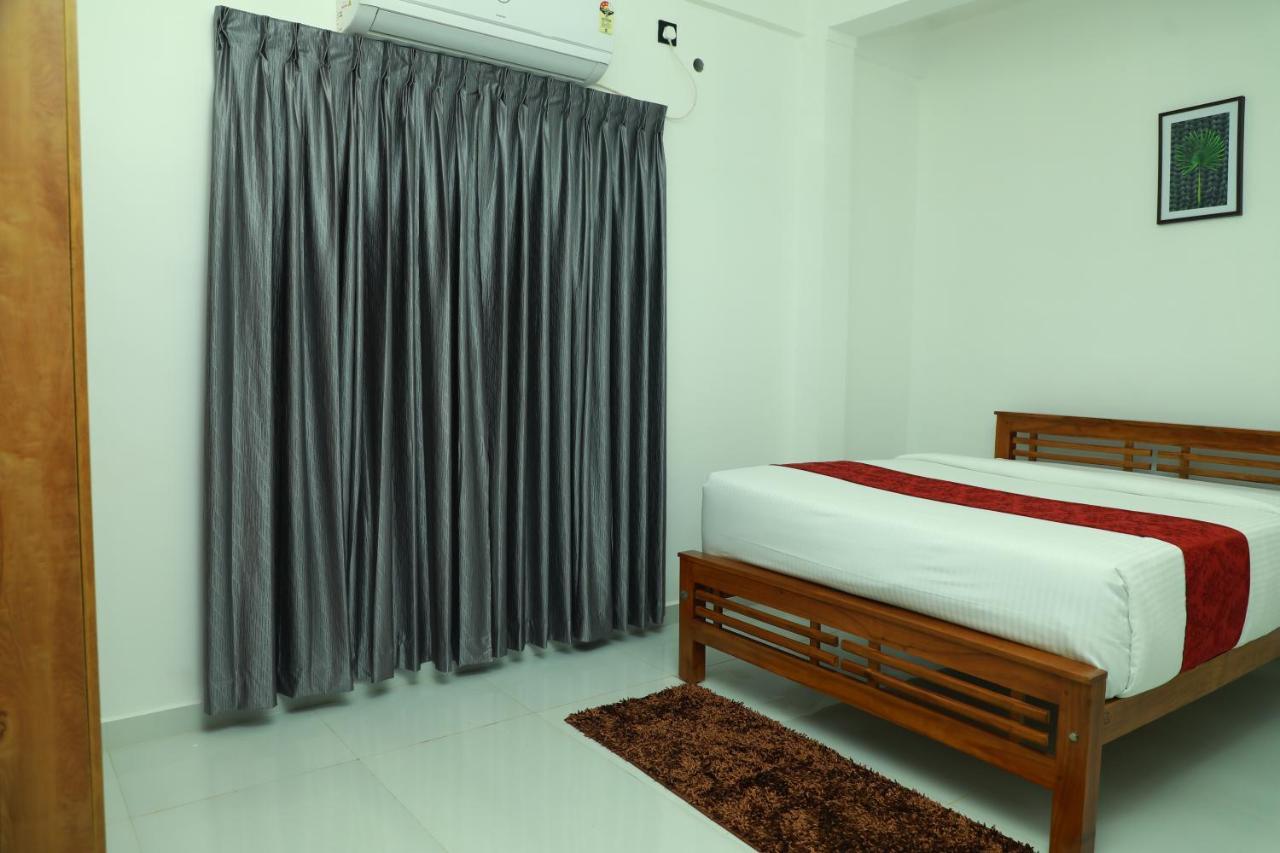 Achoos Residency Hotel Tiruvalla Buitenkant foto