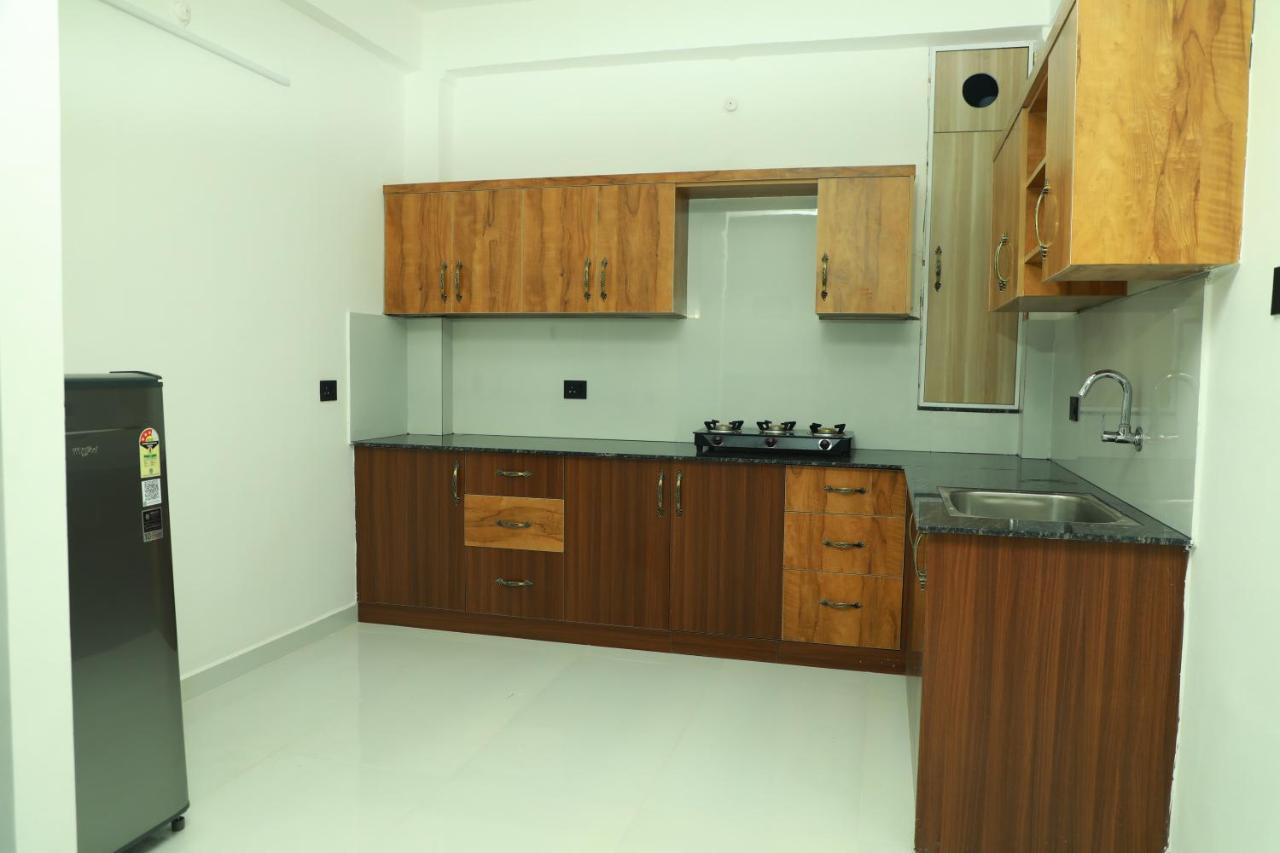 Achoos Residency Hotel Tiruvalla Buitenkant foto