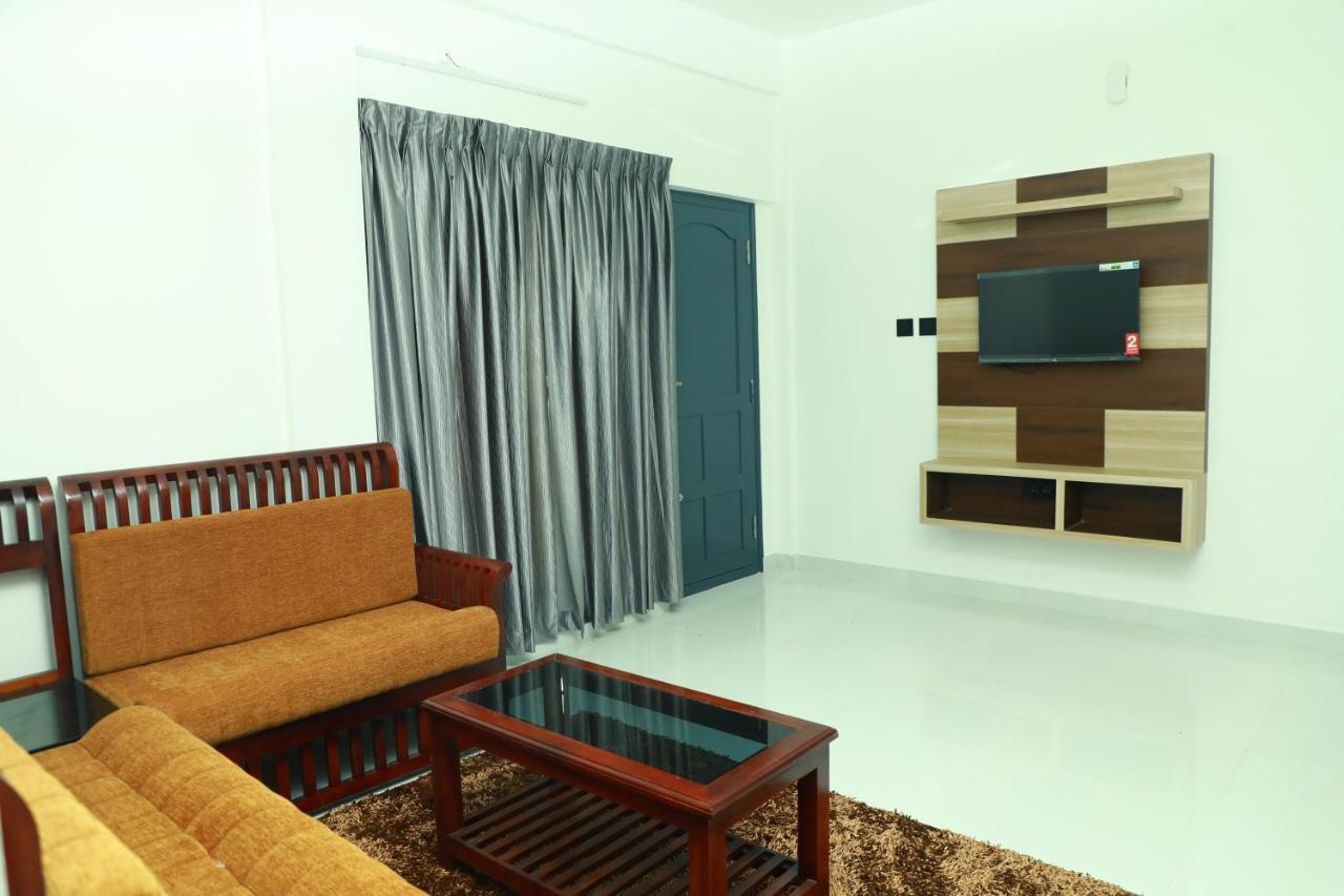 Achoos Residency Hotel Tiruvalla Buitenkant foto